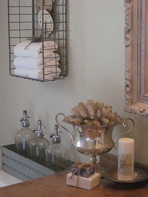 Bathroom. Love the wire basket wall storage