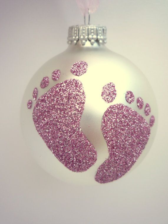 Dip their feetsies in glue and press on the ornament… then sprinkle glitter!