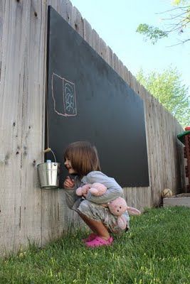 Backyard chalkboard–less mess and the rain washes it away–such a good idea!