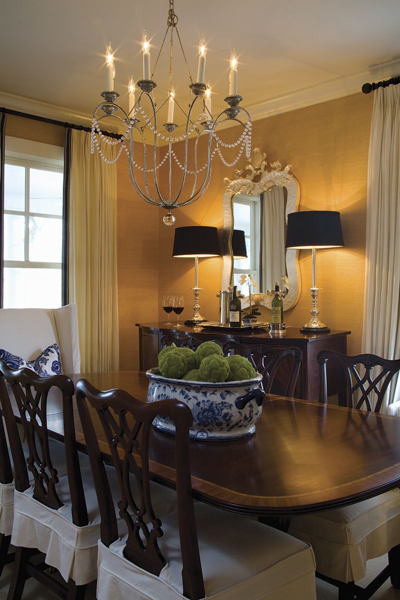 Beautiful classic dining room, textured wallpaper, black accents, a great chande