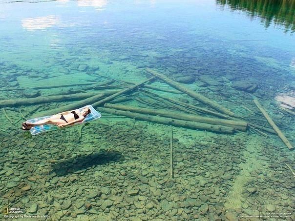 Because of the crystal-clear water, Flathead Lake in Montana seems shallow, but