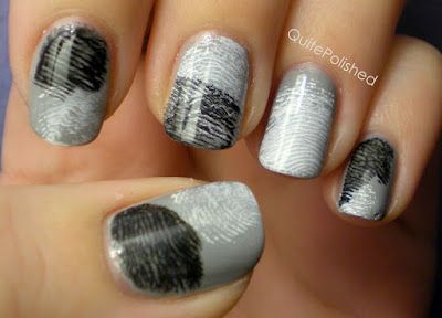 Finger print nails. Base coat, then brush a little paint on two fingers: one col