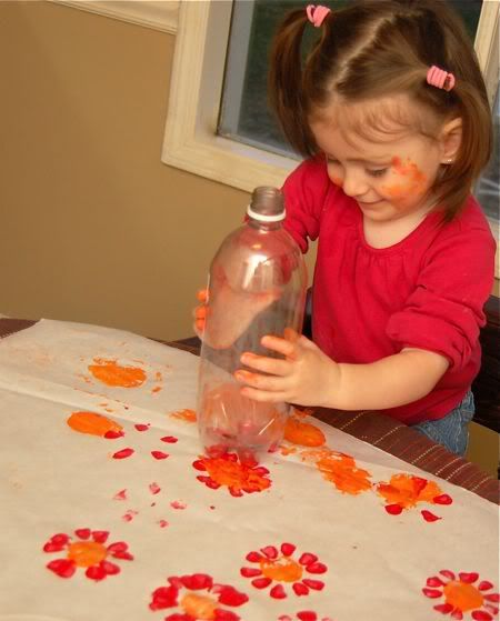 Great craft idea. Soda bottle flower prints.