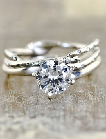 I love the band on this ring. I think I would want it without the big rock even.