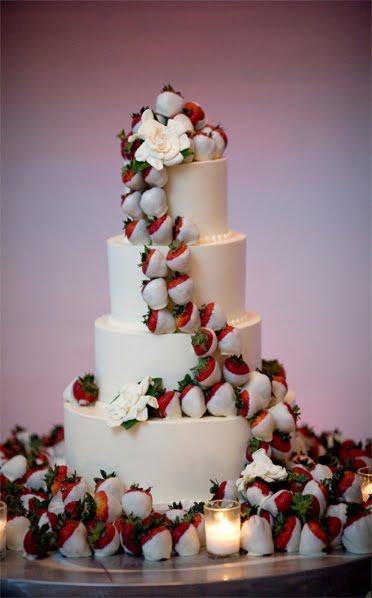 Instead of flowers on a wedding cake do chocolate covered strawberries!! So neat
