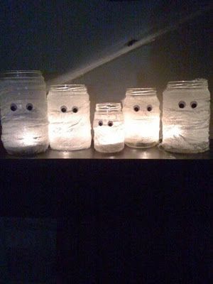 Mason Jar Mummies. Wrap Mason jar in crape paper streamers and glue on googly ey
