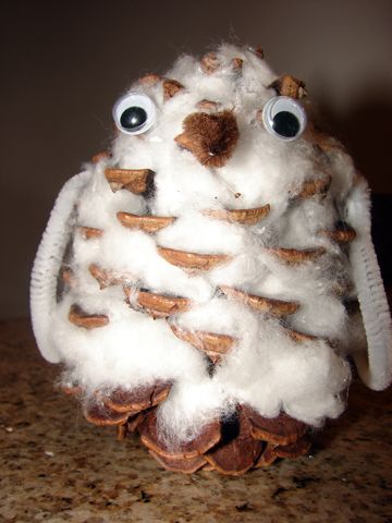 Owl made out of a pinecone and cotton balls. Loooovvvvvveeeee it!!!