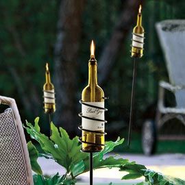 Recycle empty wine bottles into garden torches – great for an outdoor party