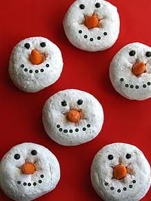Snowman Doughnut faces Ingredients A box of mini powdered donuts, black frosting