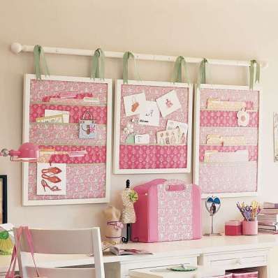 Storage made from frames, fabric and a curtain rod.