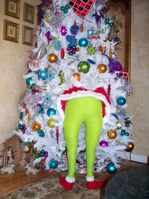 Stuff green tights full of pillow stuffing and shove him in your tree ..