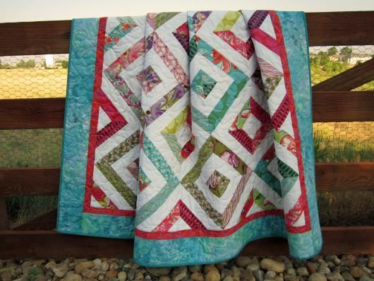 This handmade quilt is GORGEOUS!