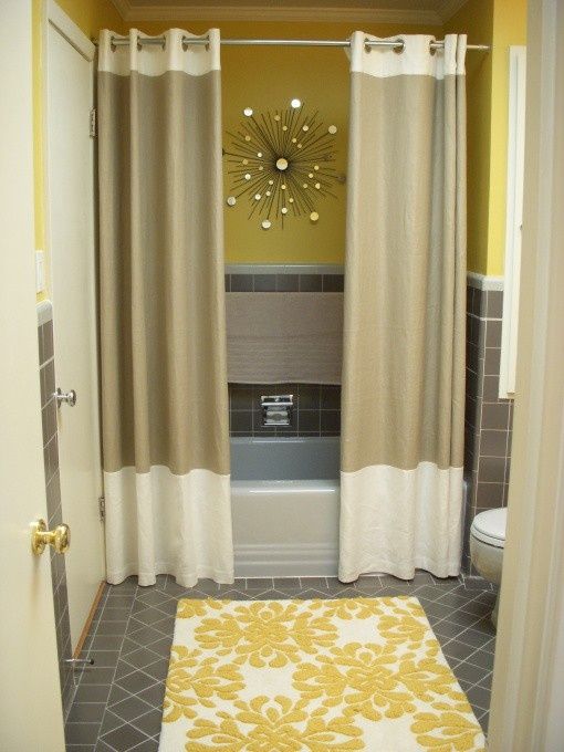 Two shower curtains. Changes the whole feel of a bathroom.
