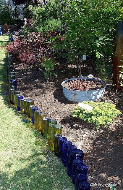 Using wine bottles as a border in the garden, this is what I was planning to do.