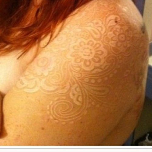 White ink tattoo.