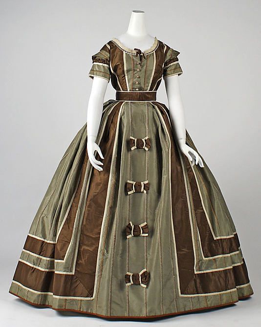 ca 1866 – silk dress – The stripes on this dress are a couched embroidery effect