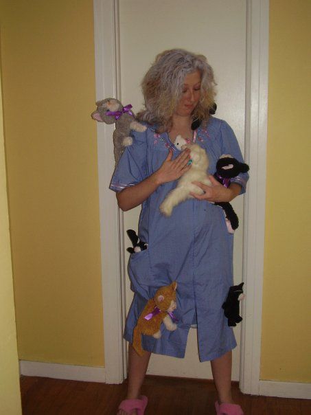 crazy cat lady costume — use bathrobe and pin stuffed animal cats to it…@A B