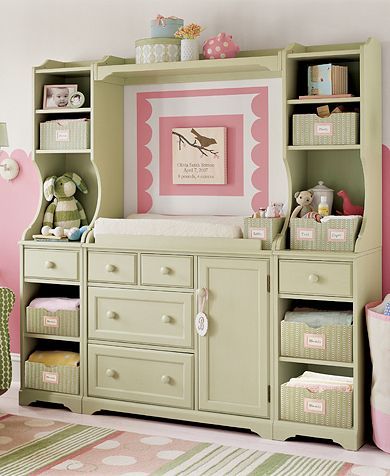 An entertainment center turned into a changing table. How beautiful!