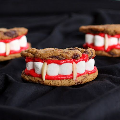 Dracula's teeth — cookies, dyed frosting, marshmallows, and almonds — SO c