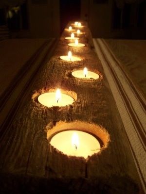 Drill holes in wood, place tea lights. Beautiful outdoor table center piece.