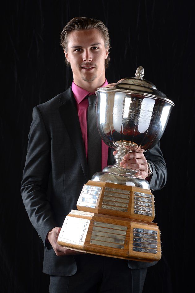 Erik Karlsson of the Ottawa Senators poses after winning the James Norris Memori
