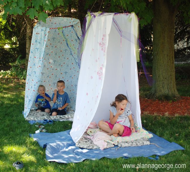 Fort made from hula-hoop and sheet.