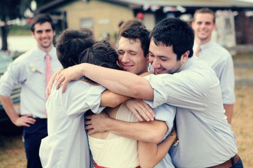 Groomsmen hugging the bride. I want my groom's boys to be this excited about