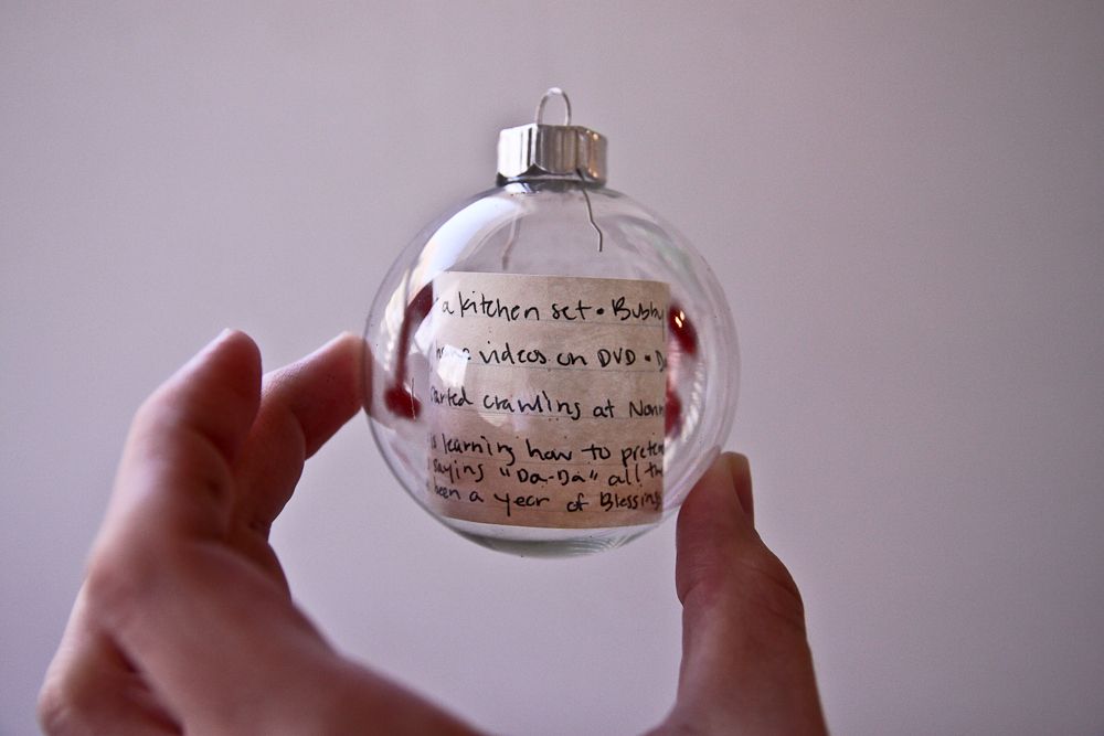 Kids' Christmas list in an ornament with the year. Absolutely love this idea