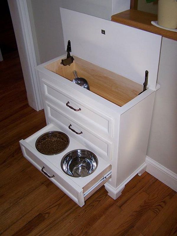 Make from small dresser. Food is kept in top with scoop. Drawers hold all pet su