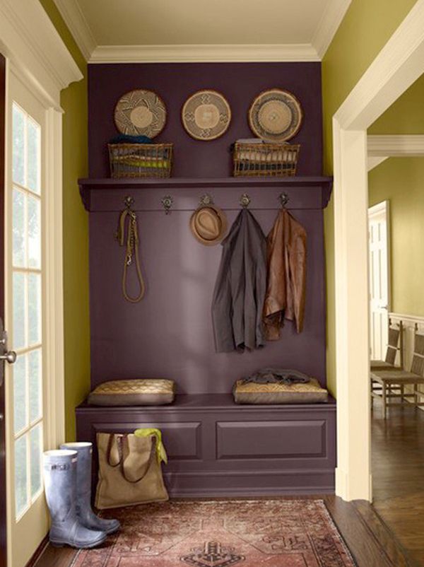 Paint a bench and shelf the same color as the wall to give the appearance of a b