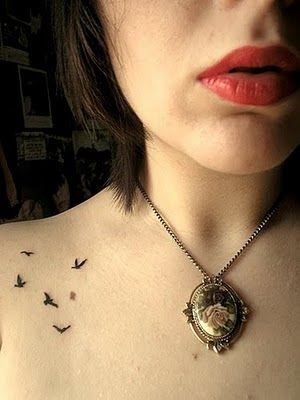 Subtle bird tattoo