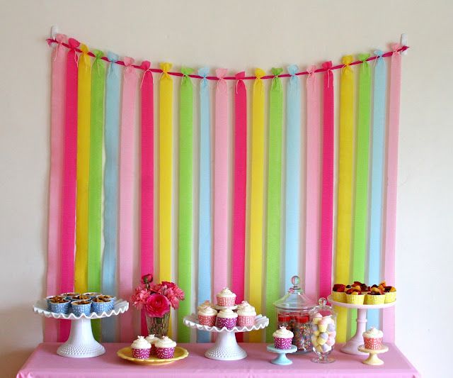 Sweet and simple backdrop idea – strips of crepe paper!