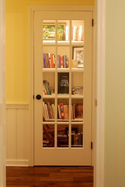 Turn a closet into a library and add a French door