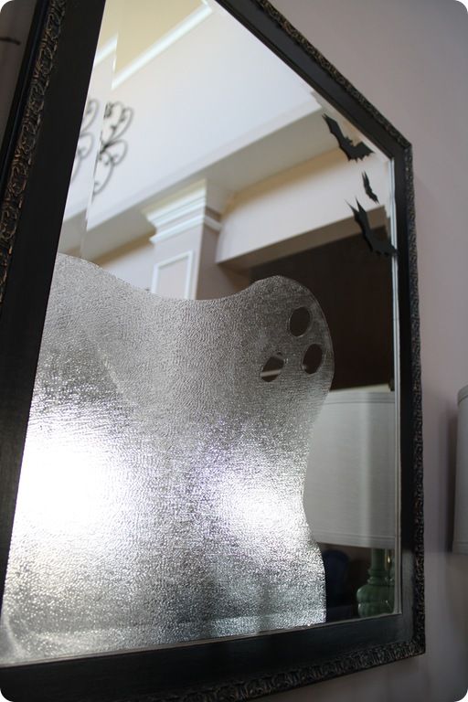 Use press 'n' seal saran wrap to make a ghostly friend in the window or