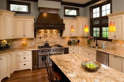 Venetian Gold granite with tile backsplash and light cabinets… Nice mix of col