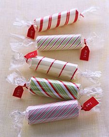 Wrap a toilet paper roll in gift wrap, insert gift inside, wrap in cellophane, a