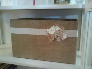 …burlap covered bin made from a diaper box,  a cheap alternative to baskets
