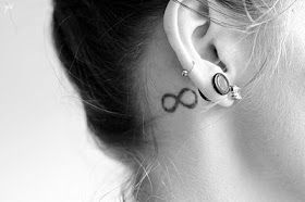 infinity tattoo behind ear