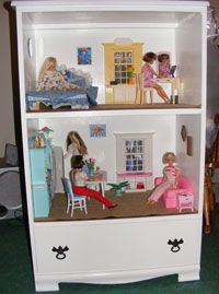 old dresser >> doll house, plus keep the bottom drawer for the dolls when