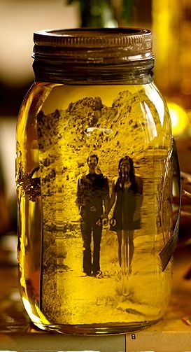picture mason jar: fill mason jar with olive oil and insert picture