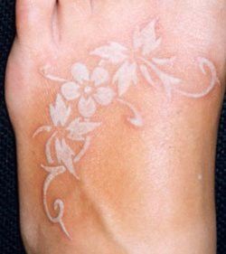 white foot tattoo