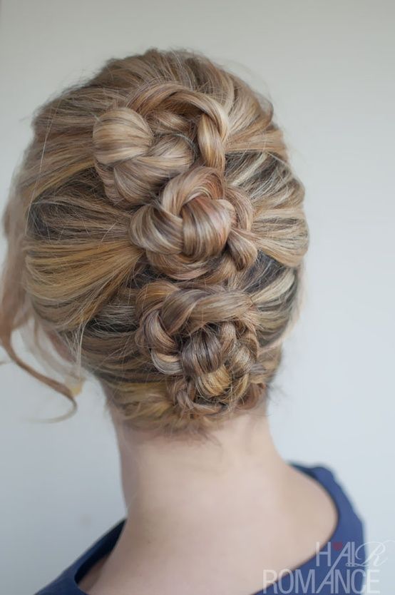 Braids…three ponies, braid, then twist into bun and pin.