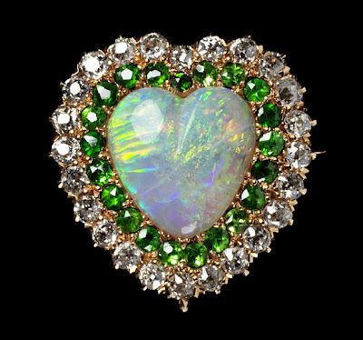Brooch of opal, demantoid garnets, and diamonds, circa 1875
