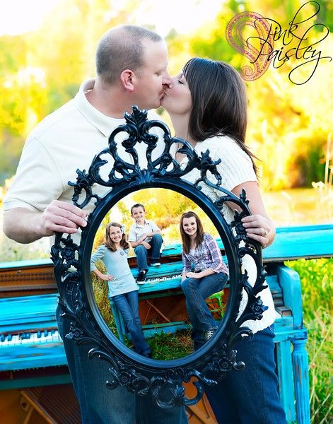 Great family photo idea using a mirror to reflect the children; absolutely posit