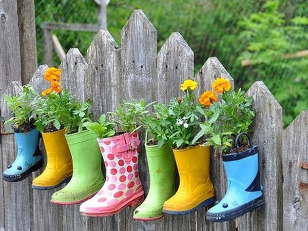 Great use for rain boots. Drill holes in the bottom for drainage, Fill the feet