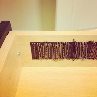 Magnetic strip: bobby pin saver inside the drawer