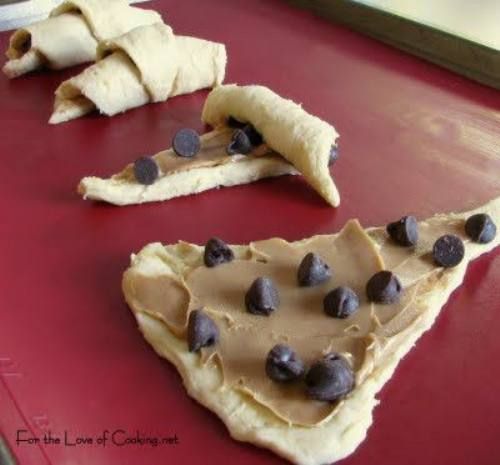 Pillsbury crescent rolls, topped with peanut butter & chocolate chips, rolle