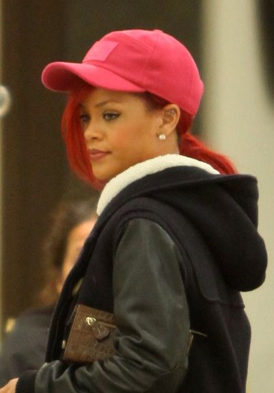 Rihannas red, curly hairstyle