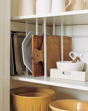 Use tension curtain rods as dividers for cupboard shelves. Great idea for cuttin