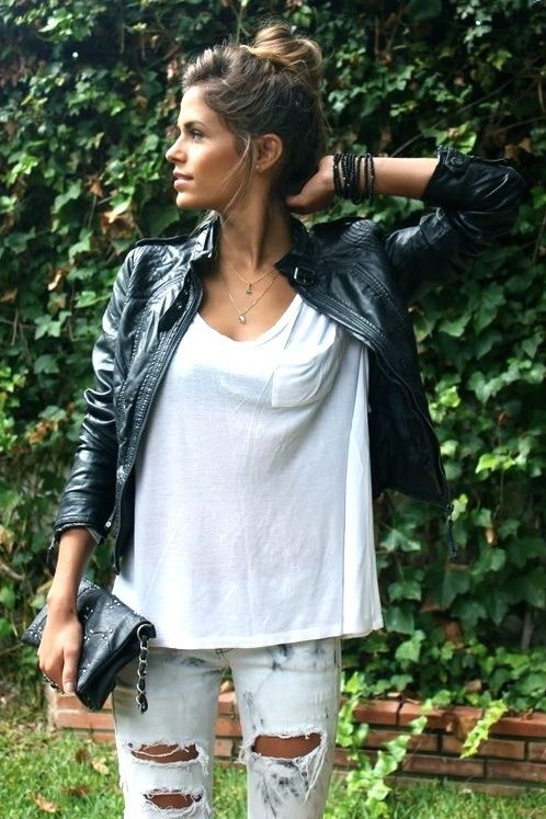 jeans. white t-shirt. leather jacket. bun.